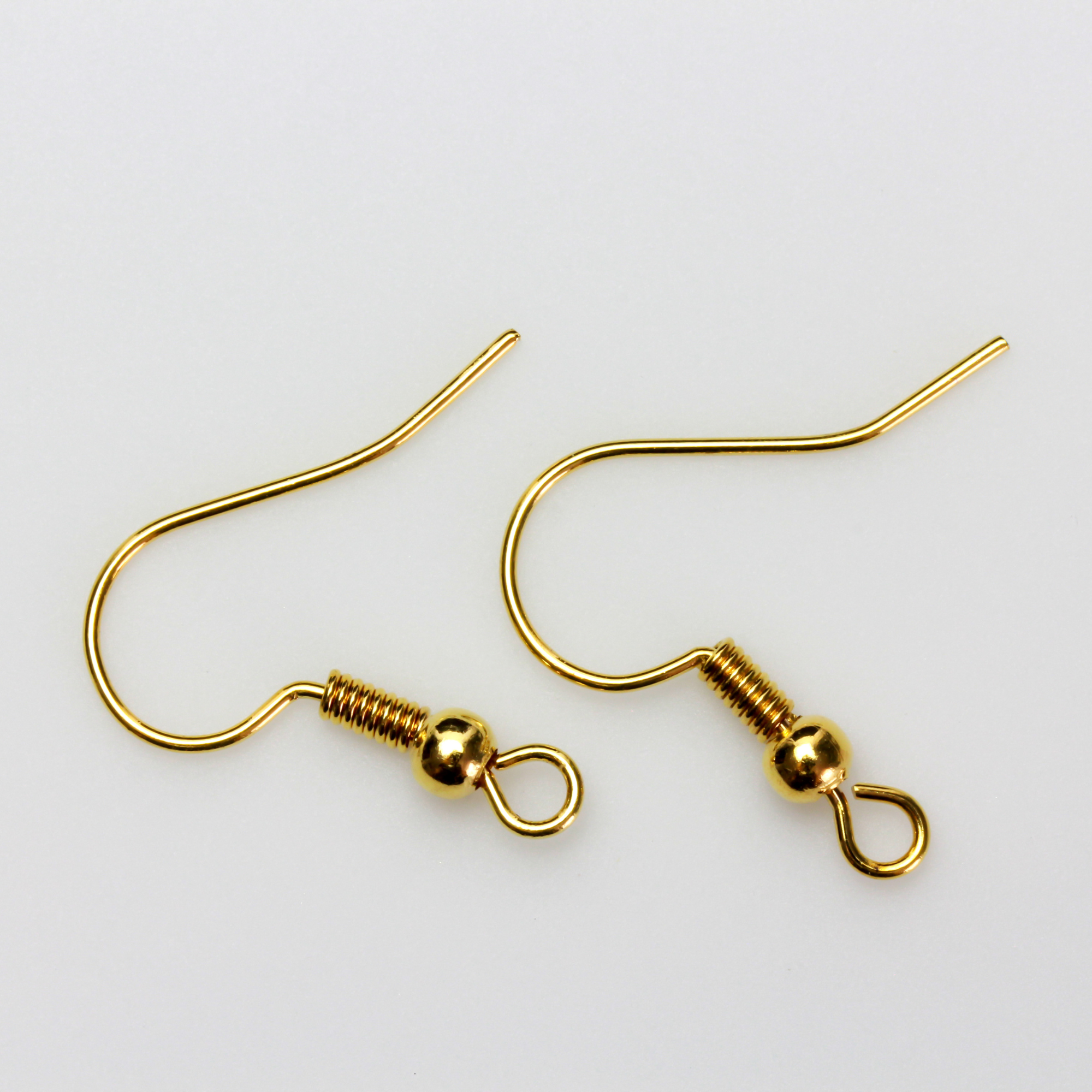 Brass earring hooks with a horizontal loop and a shiny golden finish, 21 gauge wire. Sold in packages of 30 hooks (15 pairs).