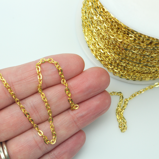 Iron cable chain that has soldered oval links that are gold tone in color. Sold in lengths of 5 feet.