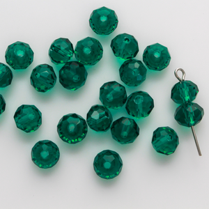 Asian cut crystal glass beads. Peacock Green transparent 8mm x 6.2mm rondelle faceted beads. Sold in packs of 60 beads