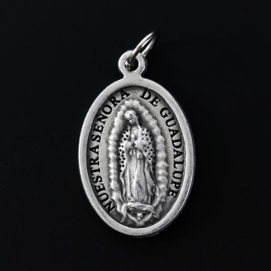 Our Lady of Guadalupe medal with the Divine Mercy of Jesus on the backside.