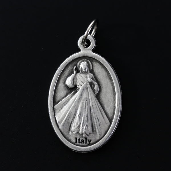 Our Lady of Guadalupe medal with the Divine Mercy of Jesus on the backside.