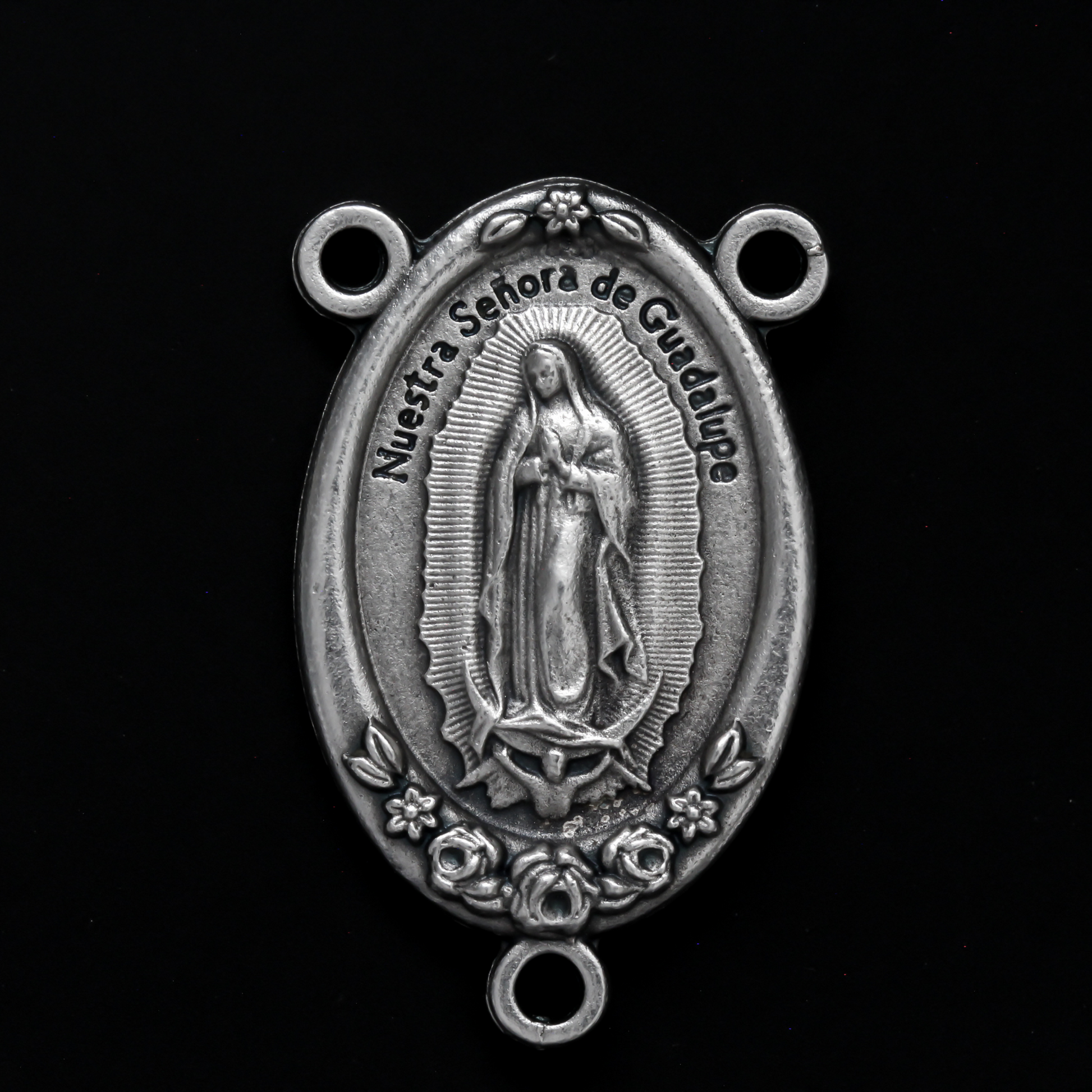 Large Rosary centerpiece that features Our Lady of Guadalupe on the front and the Divine Mercy of Jesus on the back