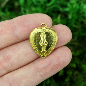heart shaped miraculous mary medal with gold tone finish