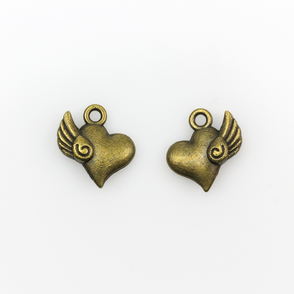 Heart charm with a small wing on the side in antiqued bronze color, 13mm x 13mm