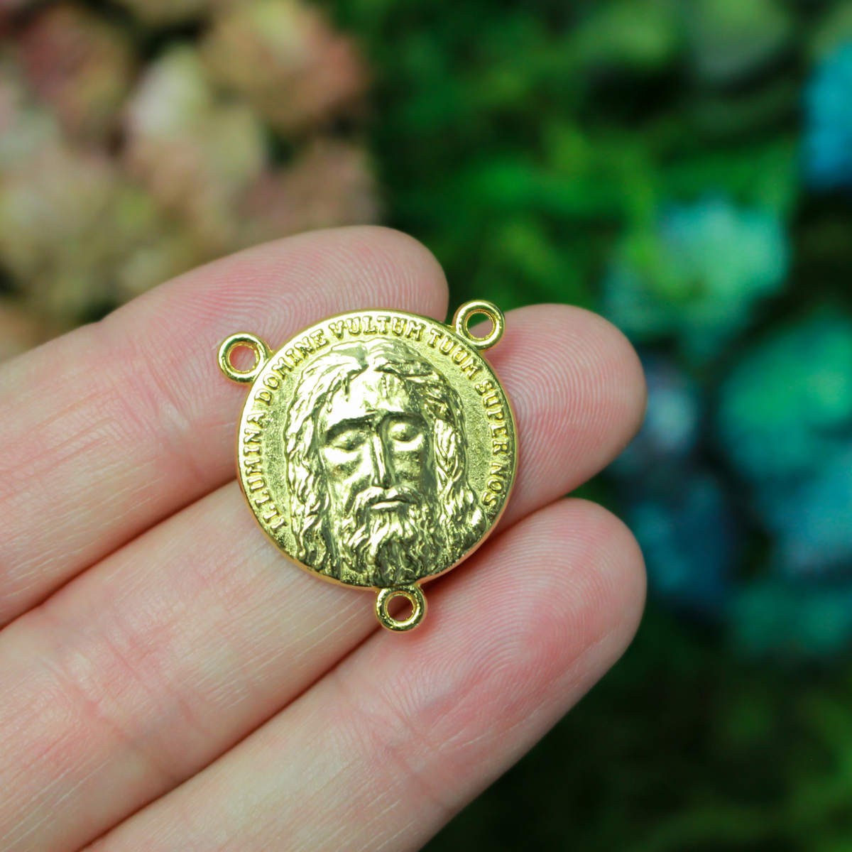 Beautifully detailed gold Holy Face of Christ rosary centerpiece