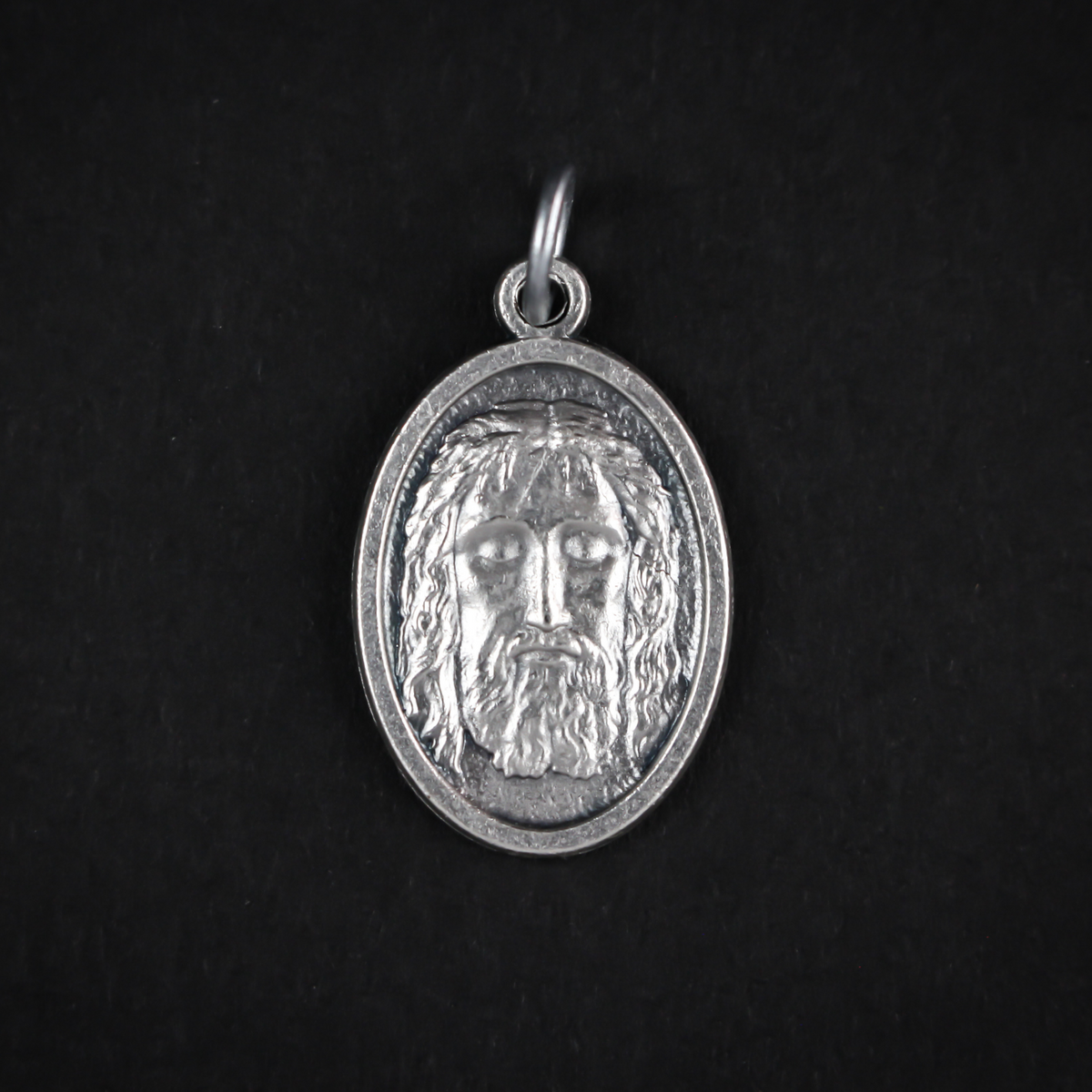 The Holy face of Jesus medal after the Holy shroud of Turin