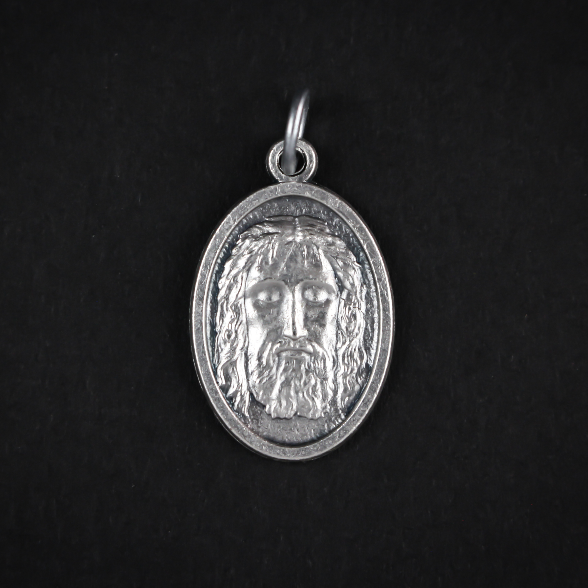 The Holy face of Jesus medal after the Holy shroud of Turin