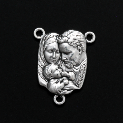 This rosary centerpiece features an image of the Holy Family on the front and "Pray For Us" on the back