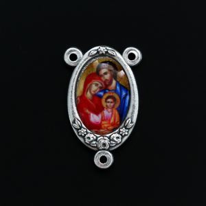 Rosary center that has a full-color image of the Holy Family inlaid in a silver oxidized center with flower details on the edge
