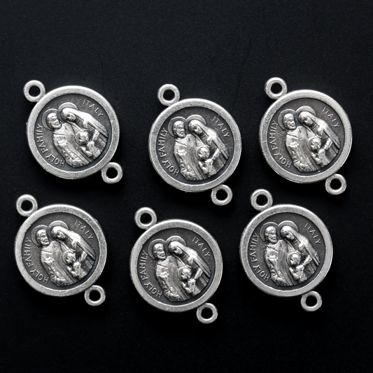 jewelry connector links featuring an image of the Holy Family on the front and the Holy Spirit on the back.
