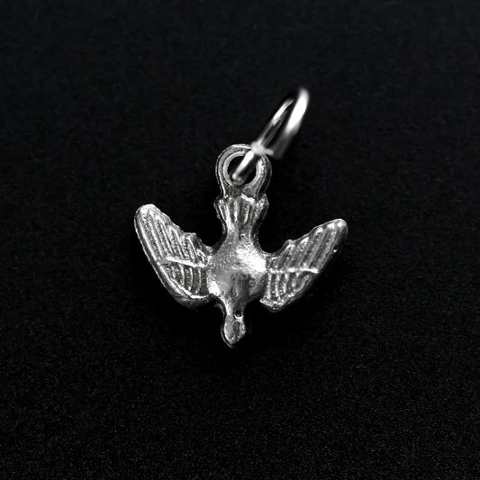 Tiny silver holy spirit dove charm with nice detail