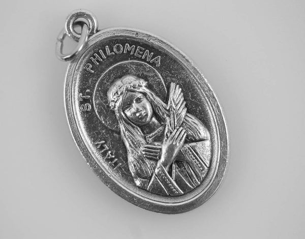 Saint Philomena die cast oval one inch medal