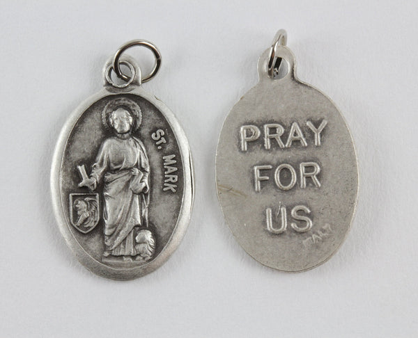 front and back view of die cast patron saint mark medal 