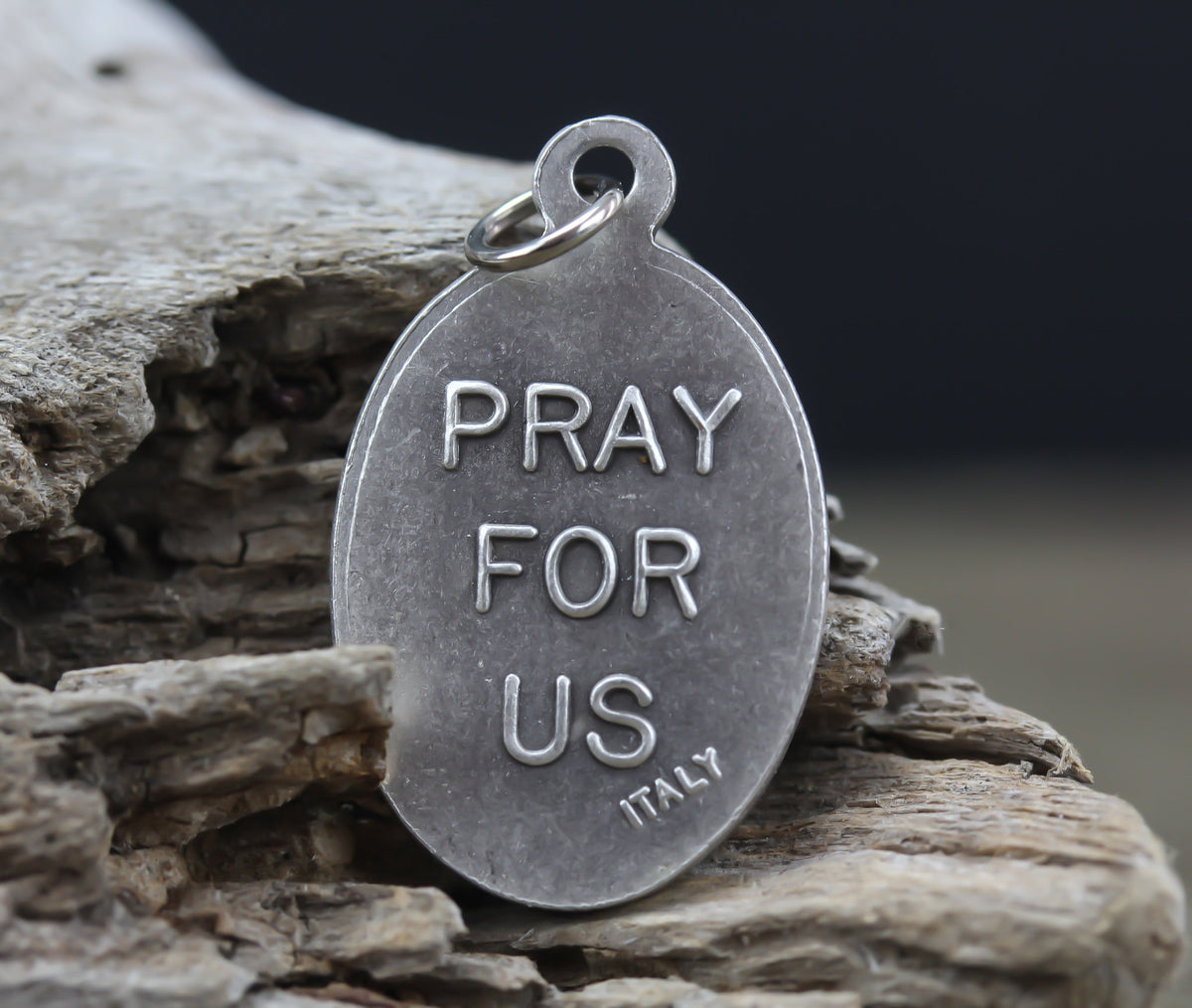 die cast silver medal depicting patron saint elizabeth ann seton