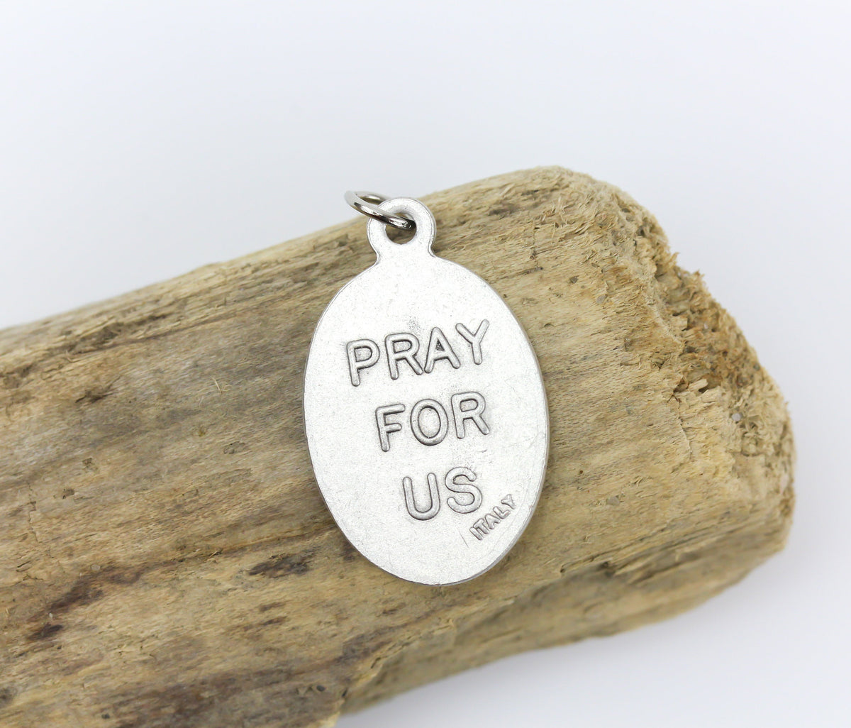 die cast silver medal depicting patron saint dorothy one inch oval