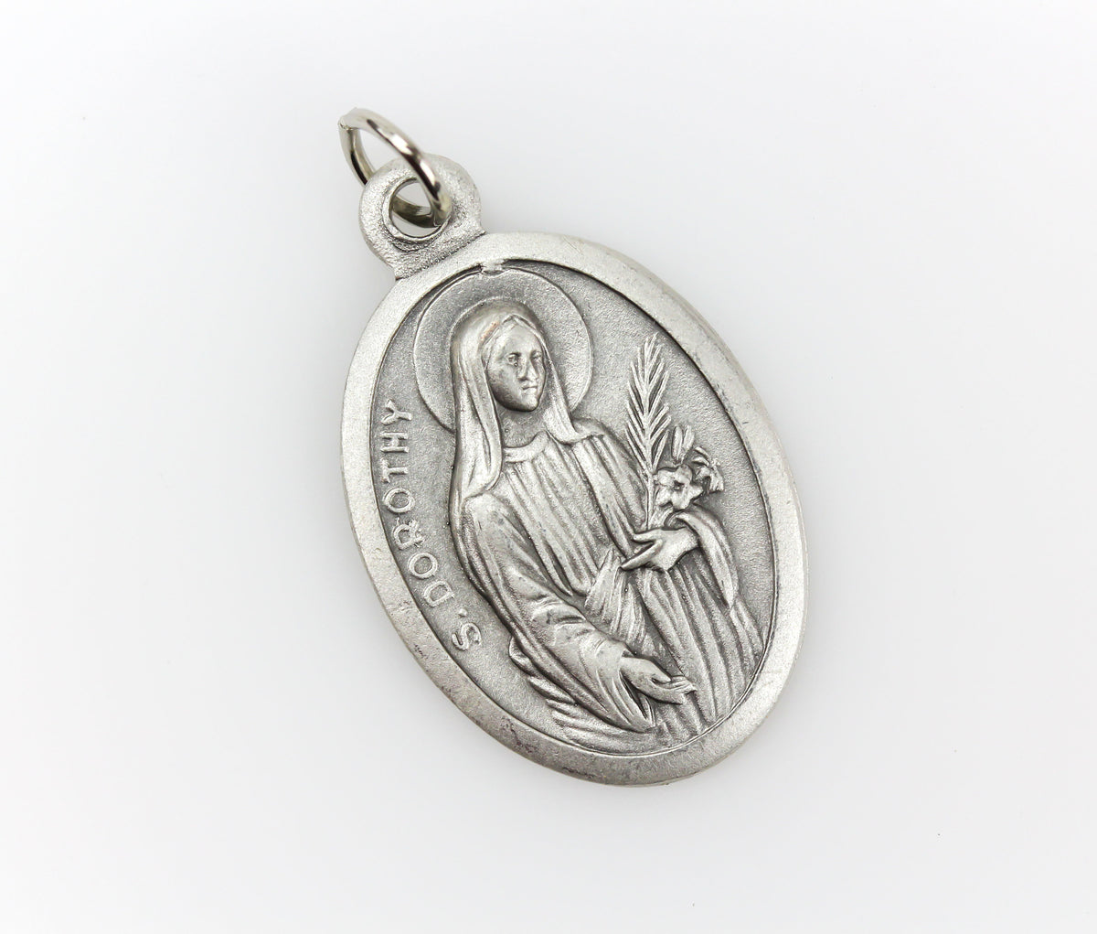 die cast silver medal depicting patron saint dorothy one inch oval