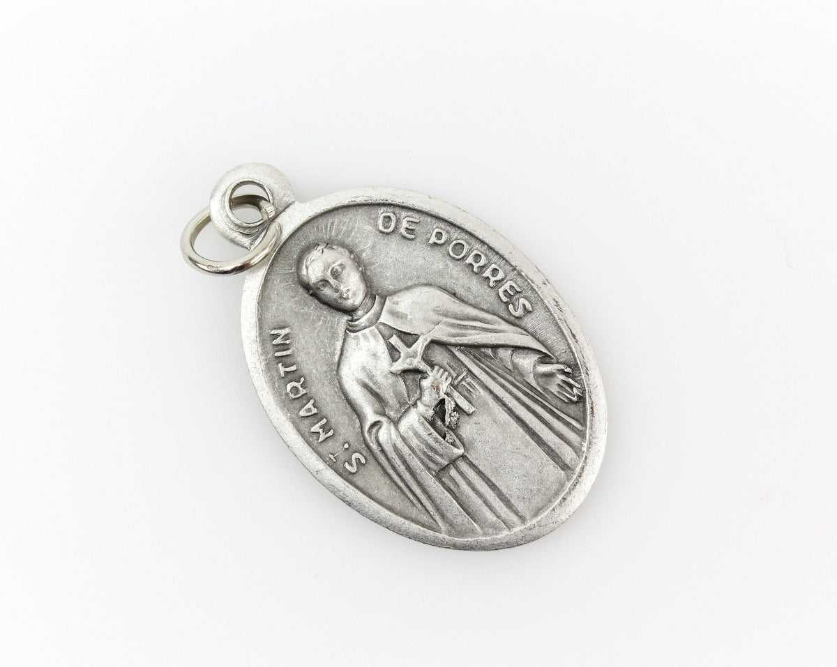 Saint Martin de Porres die cast silver one inch oval medal