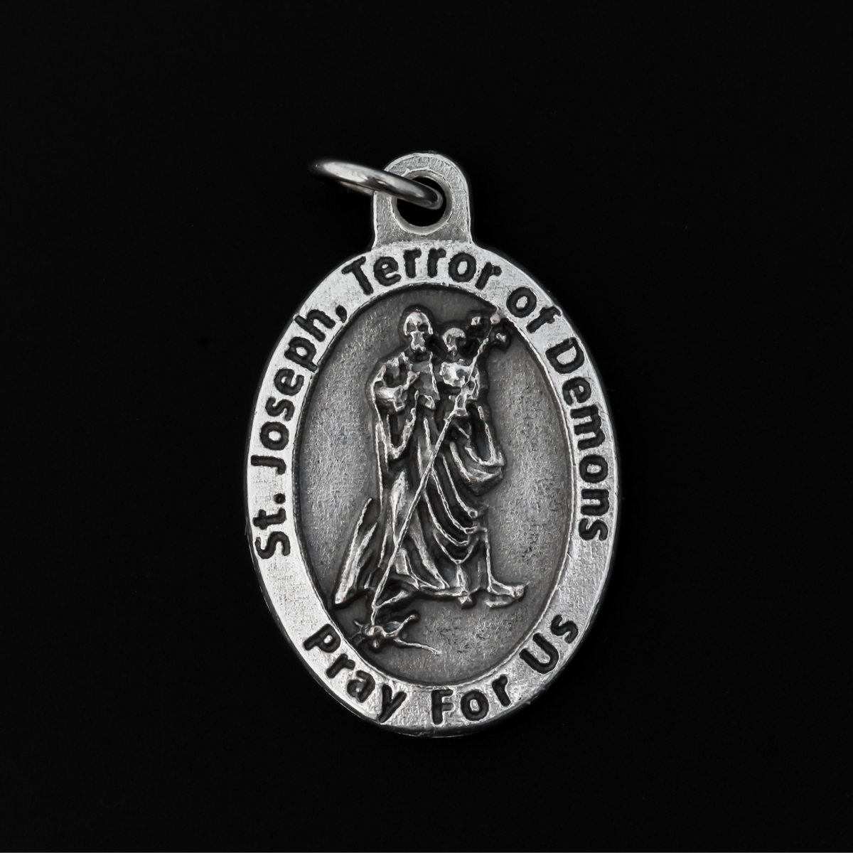 Saint Joseph, Terror of Demons medal that depicts St. Joseph as the spiritual warrior against the devil and celebrates his role in protecting us against the evil around us.