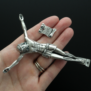 4" corpus that comes with an INRI scroll that can be attached to a cross using the pre-drilled 2mm holes