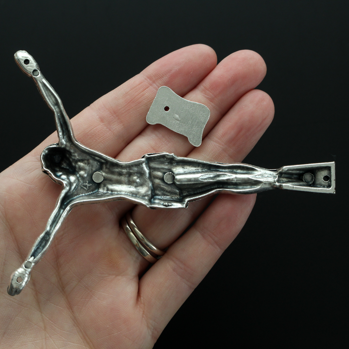 4" corpus that comes with an INRI scroll that can be attached to a cross using the pre-drilled 2mm holes