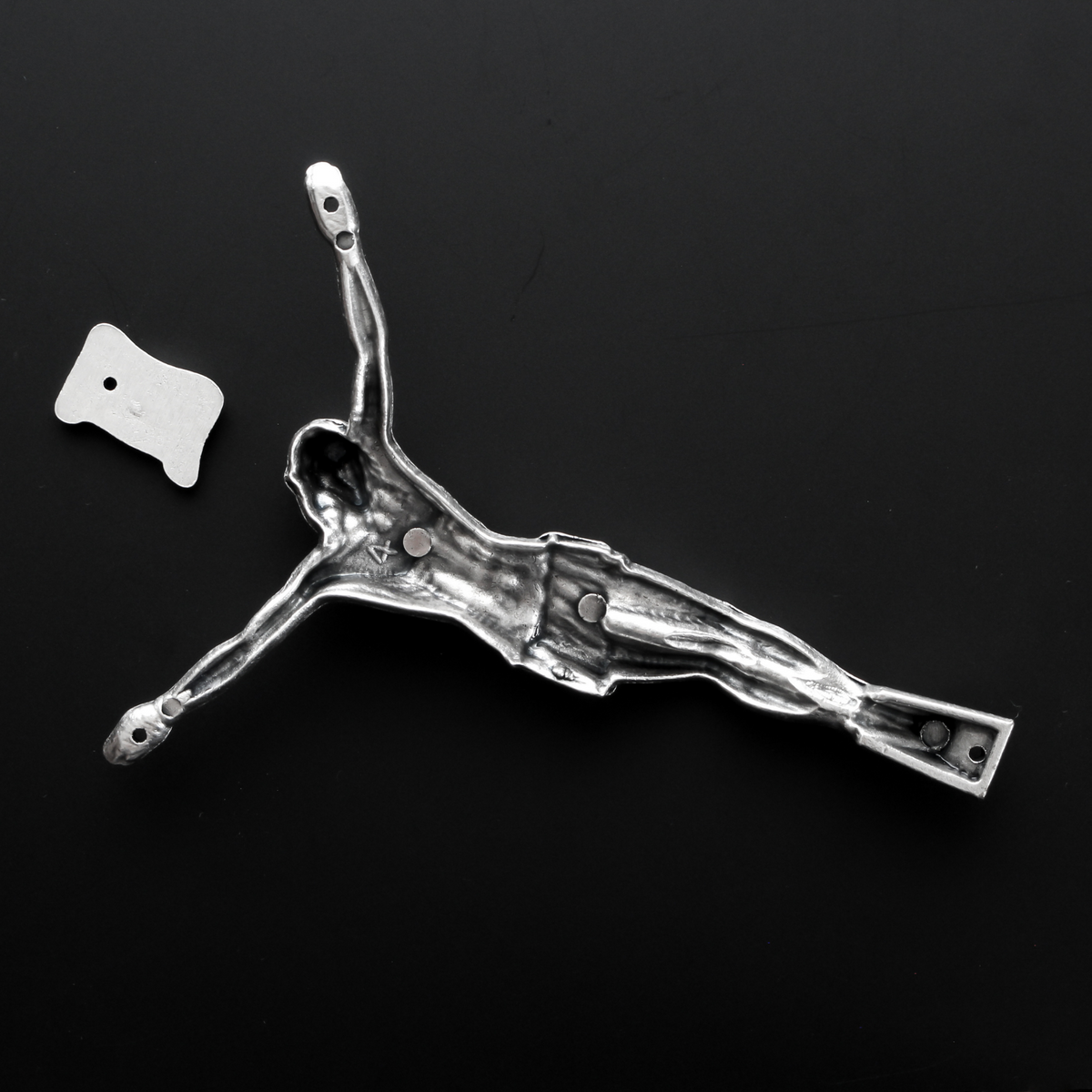 4" corpus that comes with an INRI scroll that can be attached to a cross using the pre-drilled 2mm holes