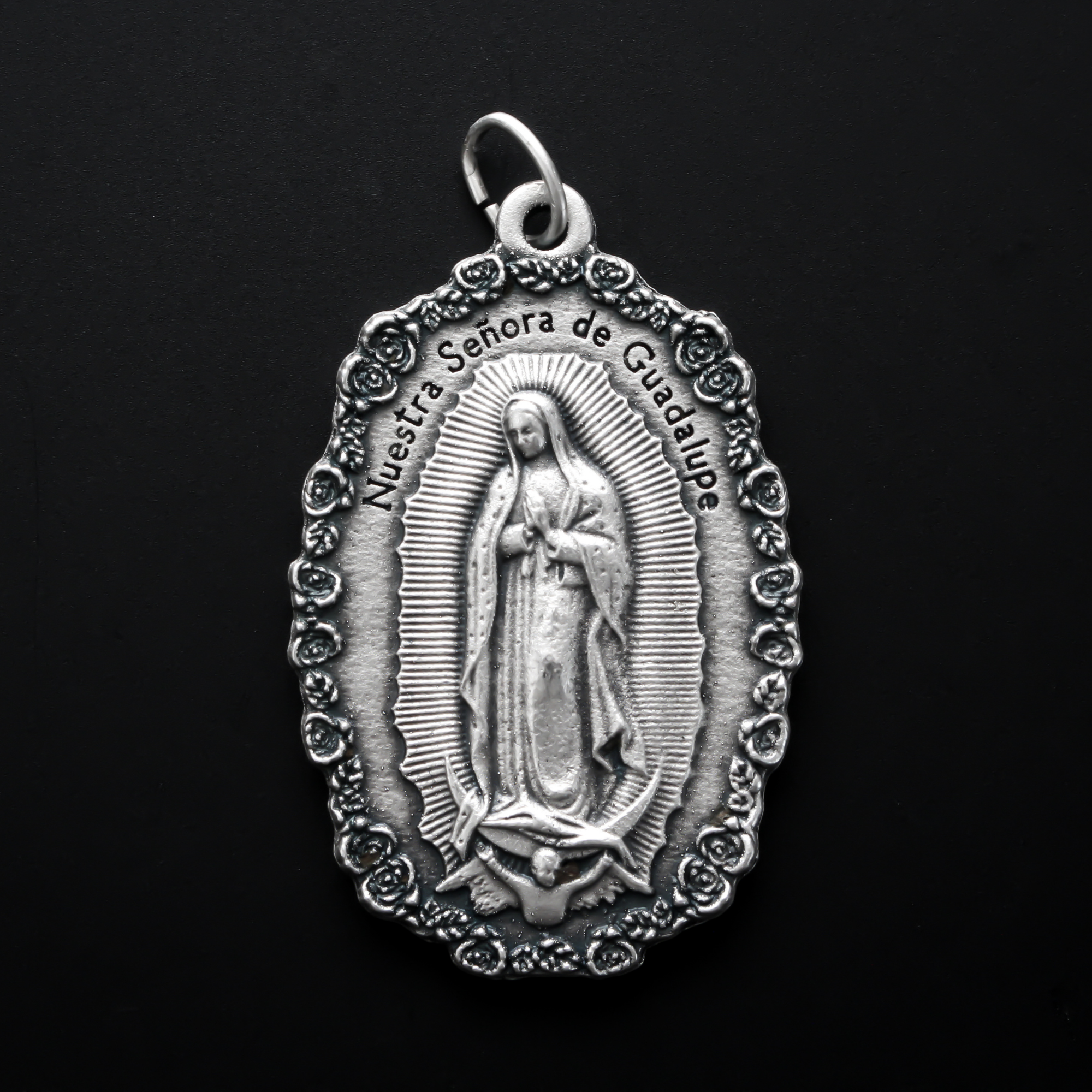 Large Spanish Our Lady of Guadalupe with Divine Mercy of Jesus medal with a rose border. 