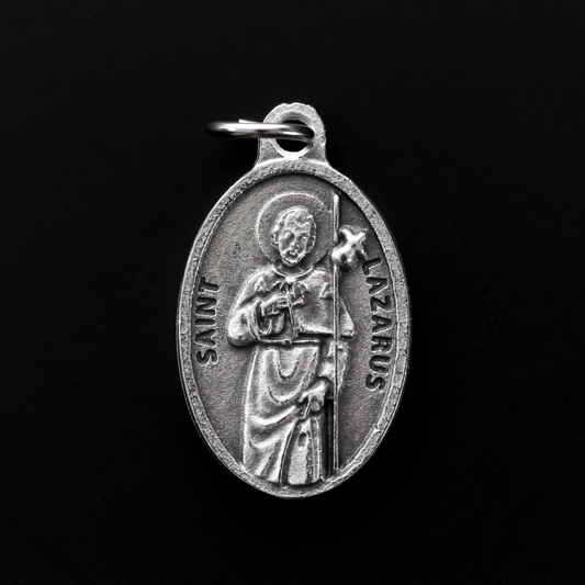Saint Lazarus of Bethany oval medal that depicts the saint on the front and "Pray For Us" on the back.