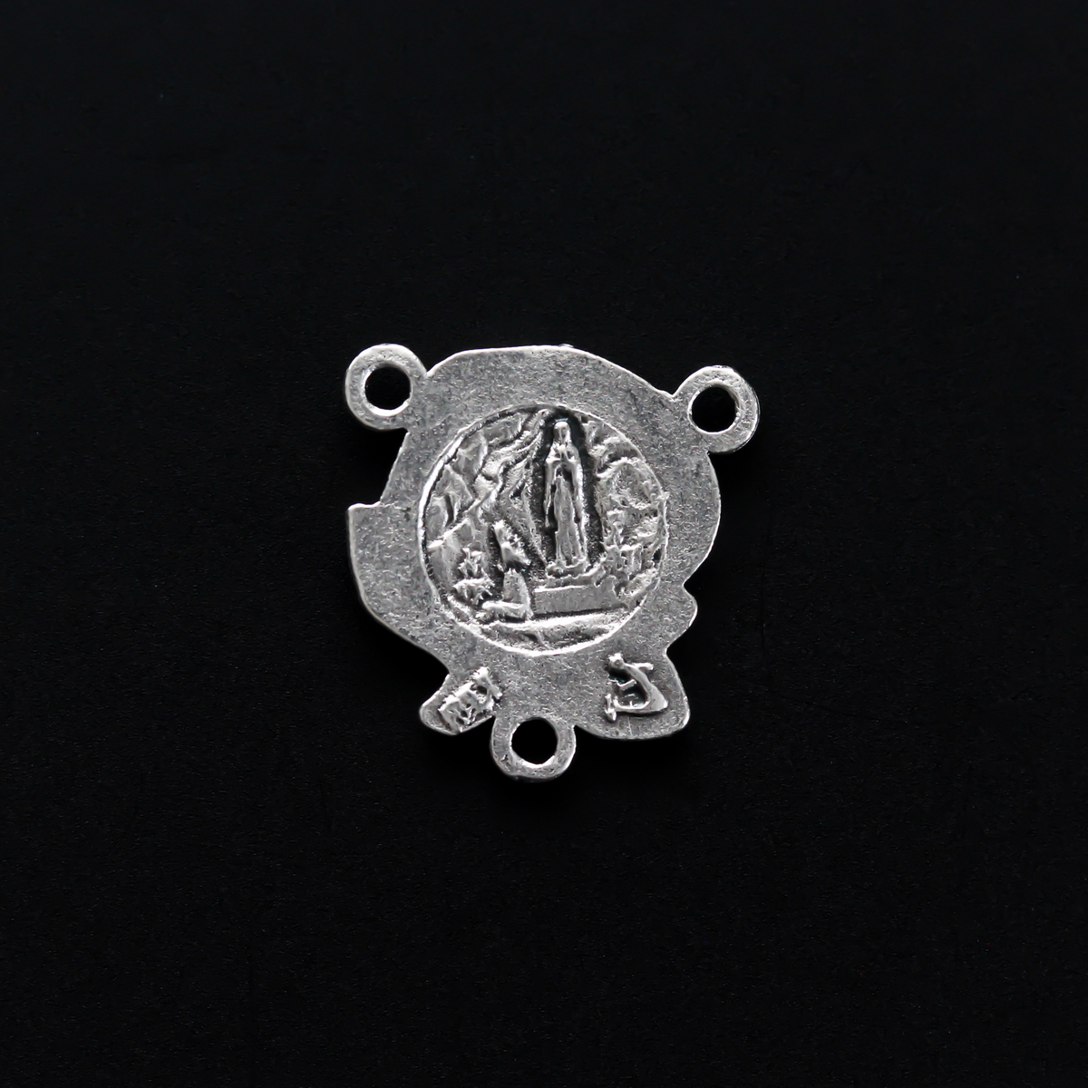 Beautiful rosary centerpiece that is shaped like a rose with Our Lady of Lourdes on the back.
