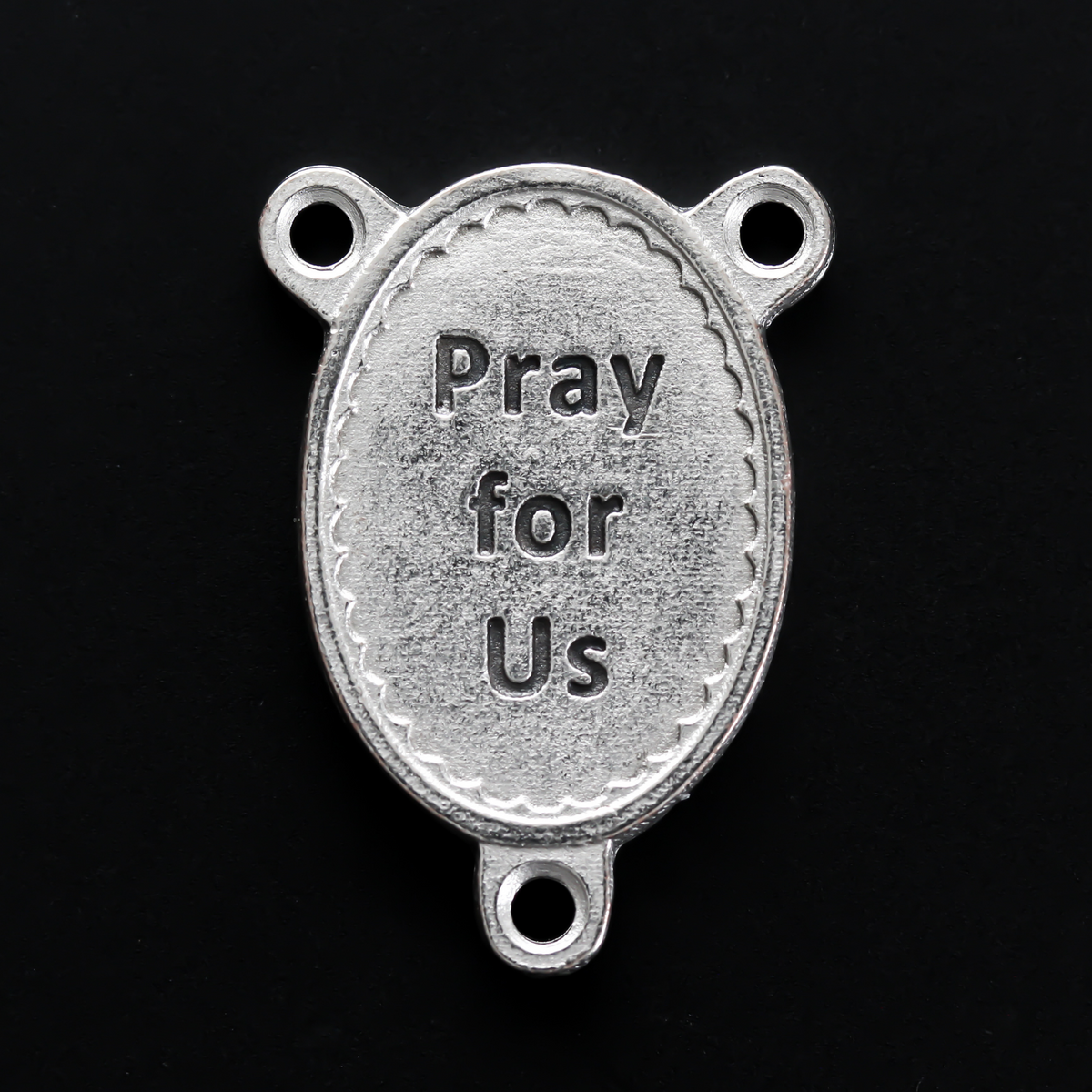 Saint Maria Goretti rosary centerpiece with a unique scalloped edge design.