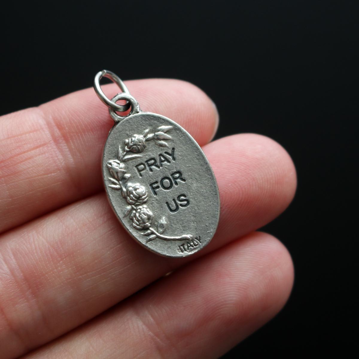 Mary Help of Christians oxidized medal has an image of the Blessed Virgin on the front and the words "Pray for Us" on the back