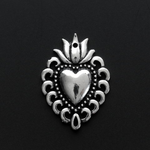 Ex voto milagro style sacred heart pendant with an antiqued silver-tone finish 28mm long