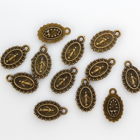 Small bracelet size bronze Miraculous medal charms with a dotted border 15mm long