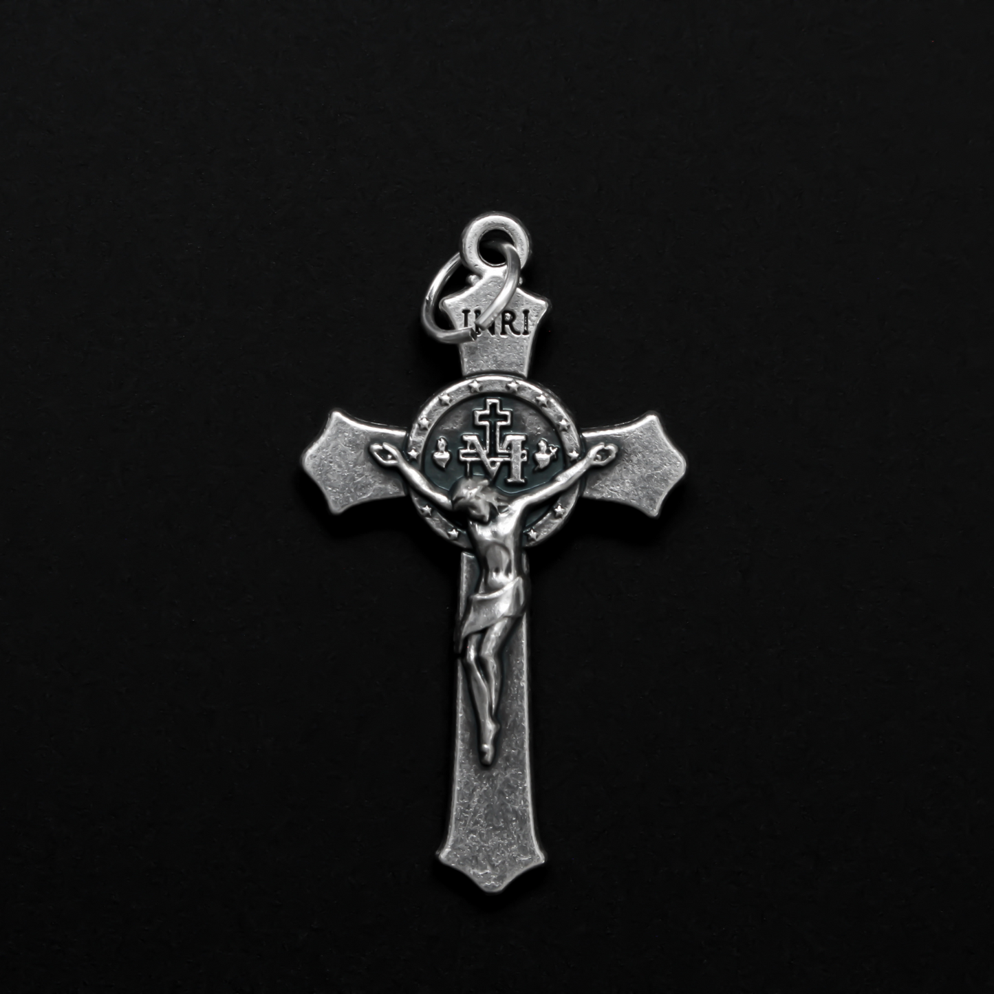 detailed Miraculous Medal crucifix that features flared edges and a detailed Miraculous Medal