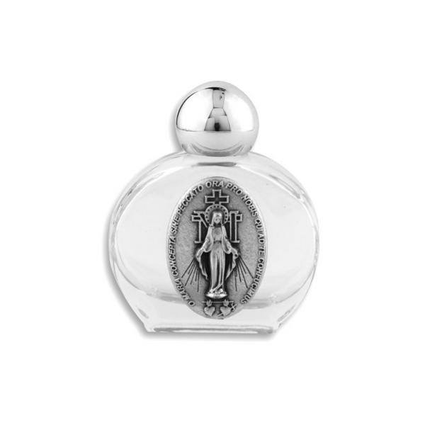 Glass holy water bottle with a metal embossed plaque of The Miraculous Medal on the front. Plastic screw on cap that is a shiny silver tone color.