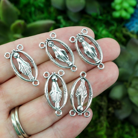 miraculous mary rosary centerpiece with cutout design