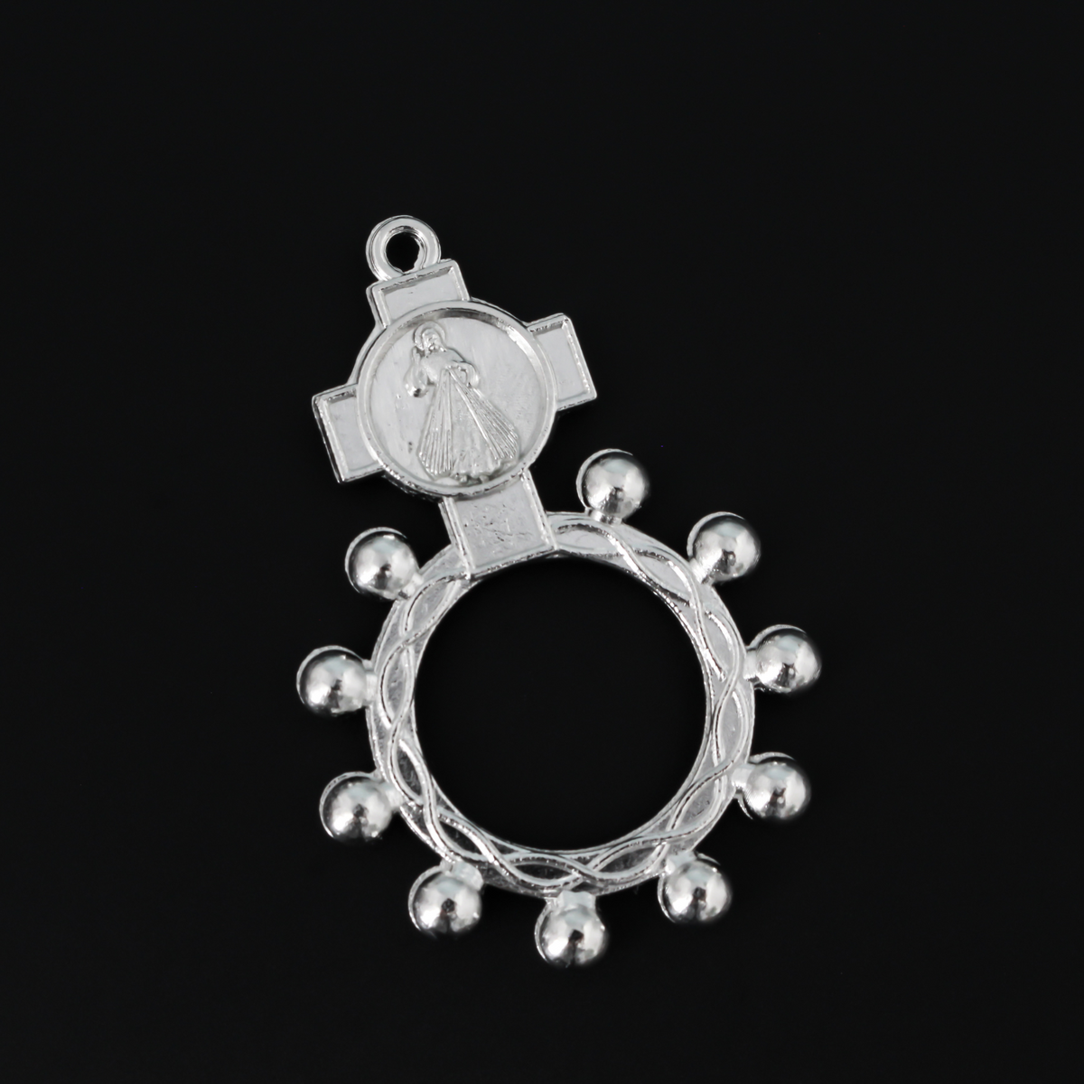 One decade rosary that features the Divine Mercy of Jesus in the cross. There is a bail at the top of the cross