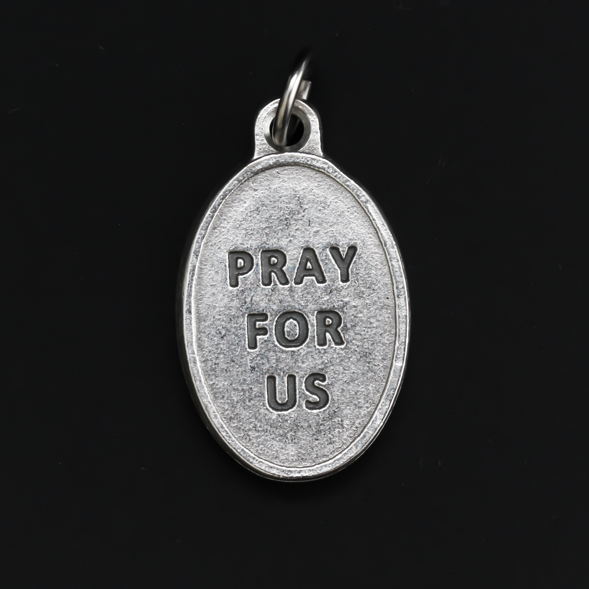 1" oval silver oxidized St. Philip Neri medal that depicts the saint on the front and Pray For Us on the back