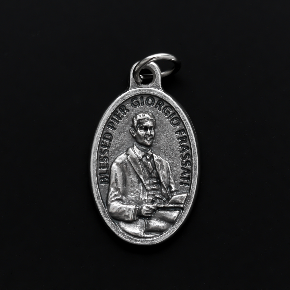 Blessed Pier Giorgio Frassati medal that depicts Pier on the front and "Pray for us" on the backside.