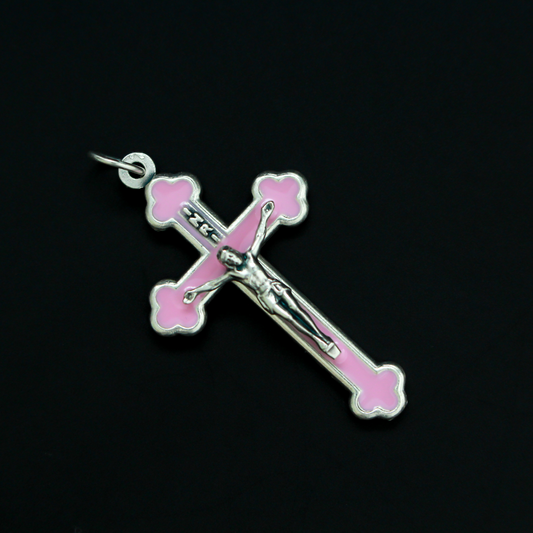 Orthodox Byzantine die-cast metal crucifix with a soft pink/mauve enamel inlay