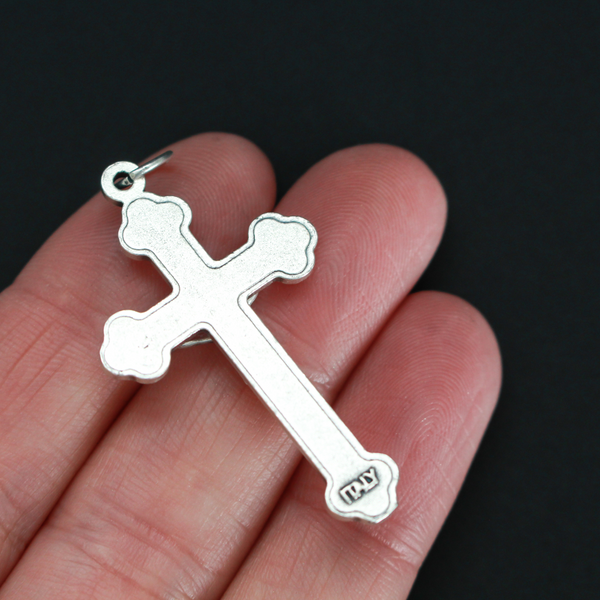 Orthodox Byzantine die-cast metal crucifix with a soft pink/mauve enamel inlay