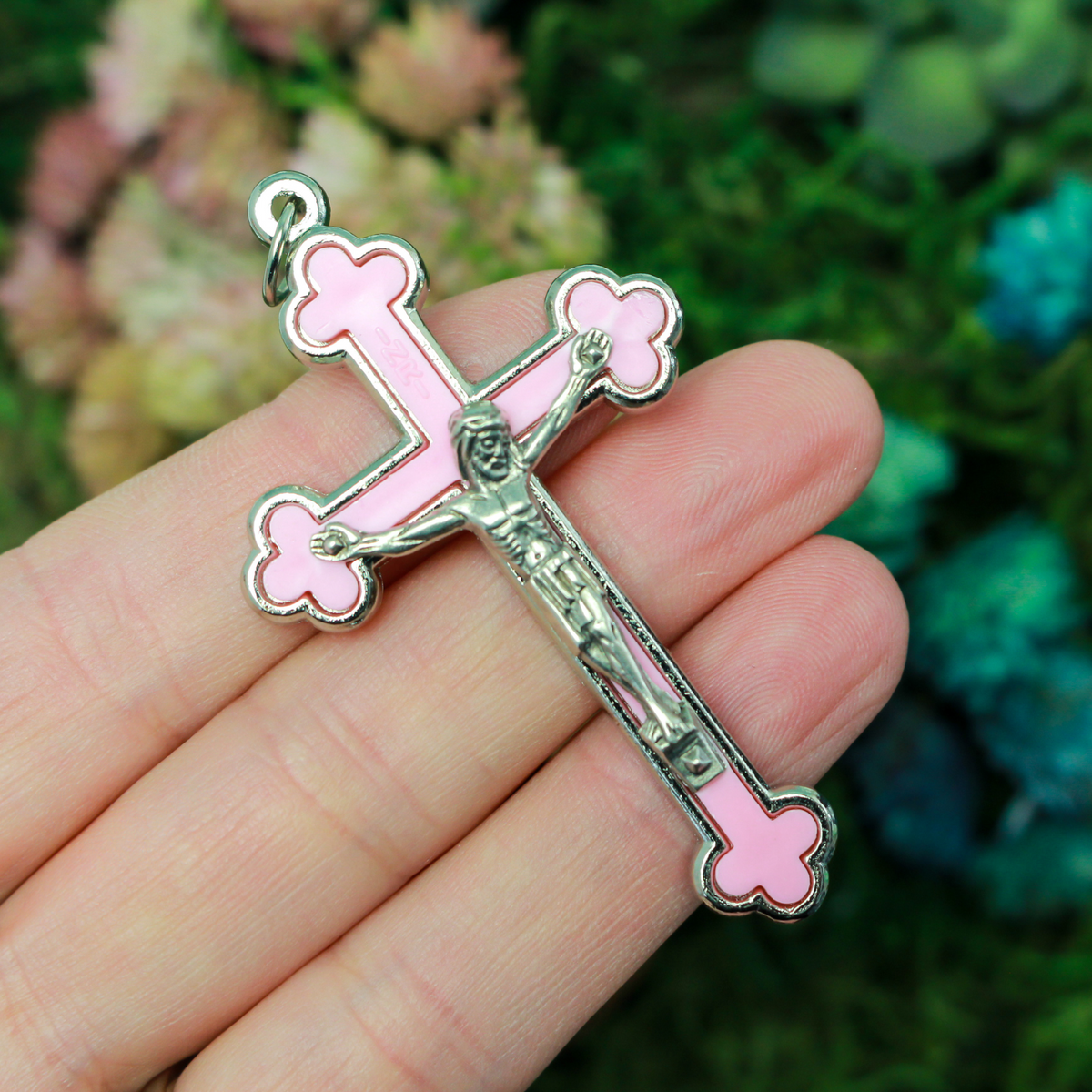 Budded pink inlay cloverleaf crucifix with silver corpus and trim, 2.5 inches long