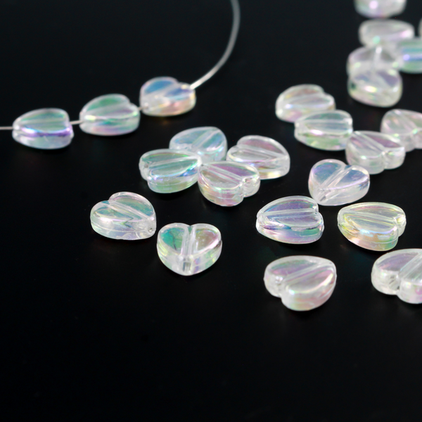 Acrylic AB (aurora borealis) clear transparent beads that are are heart shaped