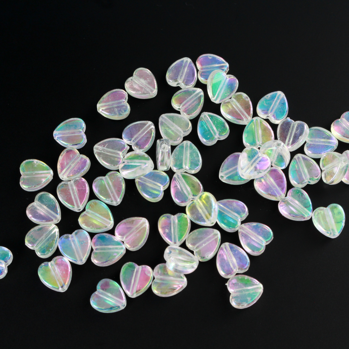 Acrylic AB (aurora borealis) clear transparent beads that are are heart shaped