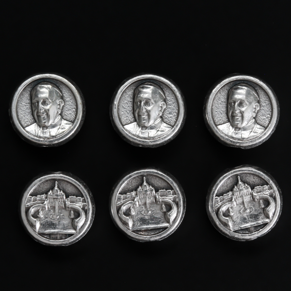 Metal spacer beads that depict an image of Pope Francis on the front and the Vatican (St. Peter's Basilica) on the back