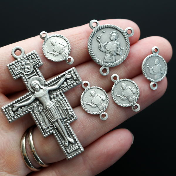 Devotional Medal set of the Prayer of St. Francis of Assisi. The set consists of six pieces: The San Damiano Crucifix, four small connector medals, and one centerpiece to make one chaplet