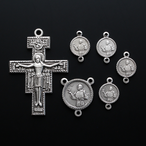 Devotional Medal set of the Prayer of St. Francis of Assisi. The set consists of six pieces: The San Damiano Crucifix, four small connector medals, and one centerpiece to make one chaplet