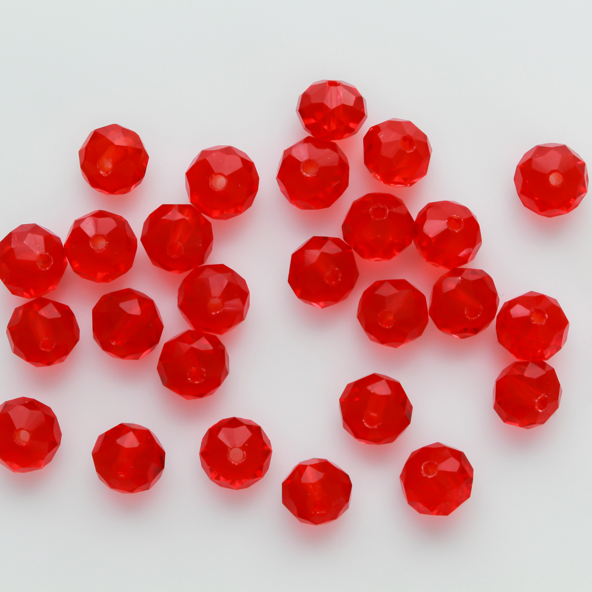 Asian cut crystal glass beads. 8mm x 6.2mm rondelle faceted red transparent. Sold in packages of 60 beads