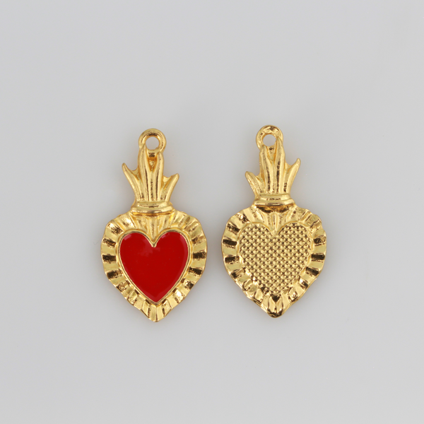 Sacred Heart Ex Voto charms that are a shiny gold color with red enamel detail.