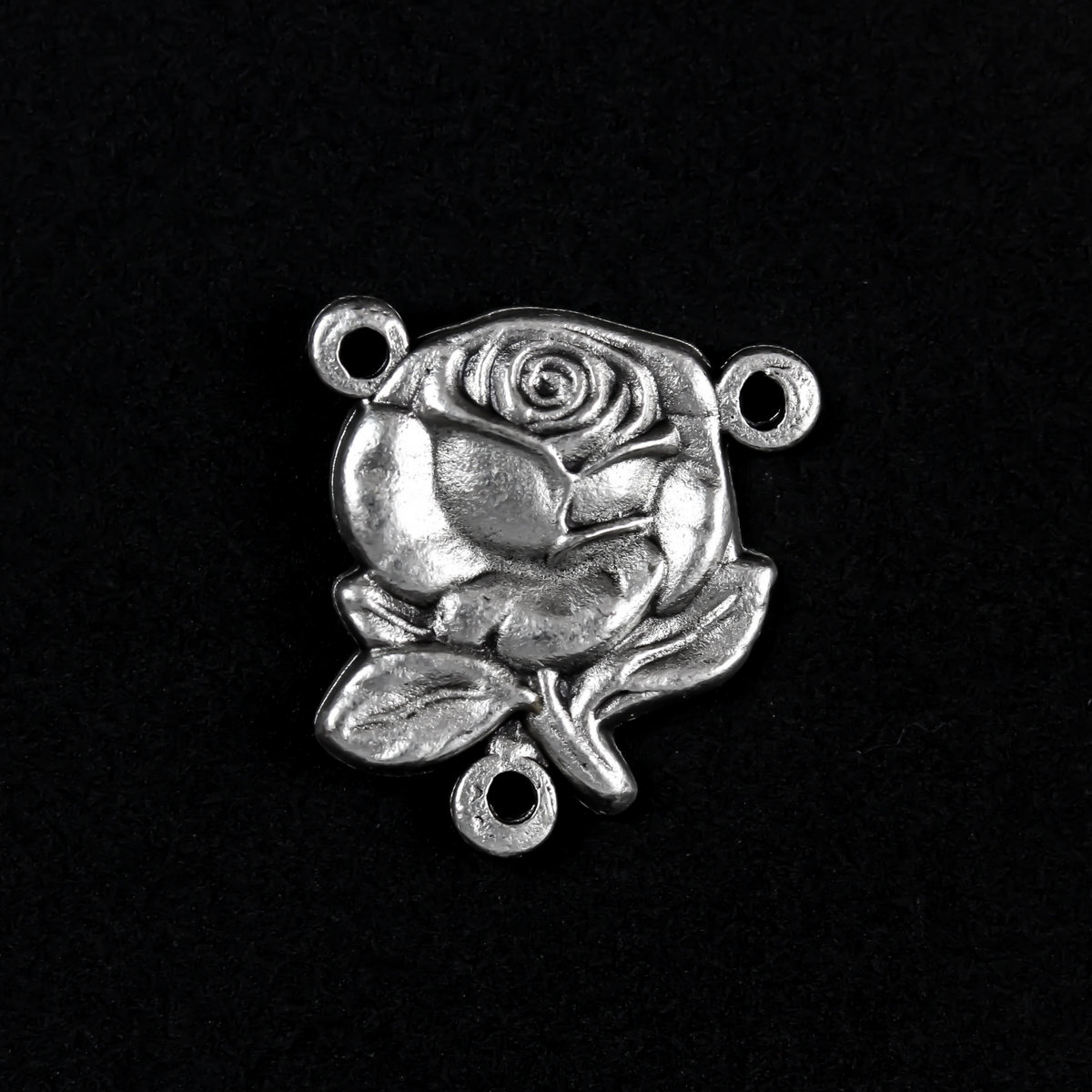 rose shaped rosary centerpiece with our lady of grace on the back