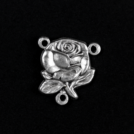 Beautiful rosary centerpiece that is shaped like a rose with Our Lady of Lourdes on the back.